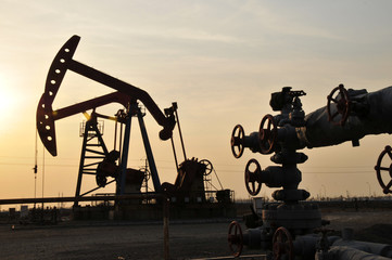 Drilling rig at sunset