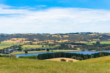 Aerial view of pictureesque rural landscape with water dam, lake
