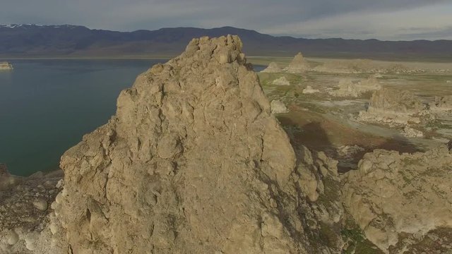 Orbiting Alien Rock Close Over Desert Lake and Islands