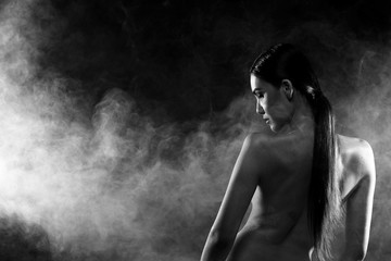 Topless show back view of Beautiful woman body and side light show silhouette curve naked inside, sensual erotic in black and white photo portrait half body, copy space for text logo