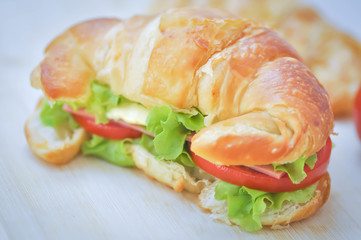 croissant sandwich with cheese and ham