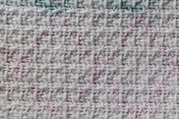 Knitting threads with a large pattern. The texture of the fibers is white