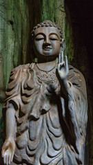 Fototapeta na wymiar Buddha shrine in the caves of Marble Mountain, Danang, Vietnam