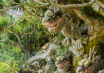 dragons  crawling out of the side of Marble Mountain