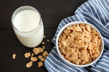 Healthy Corn Flakes with milk for Breakfast on table
