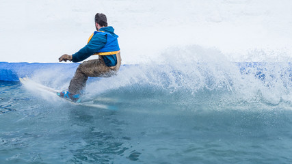 People are having fun doing pond skim