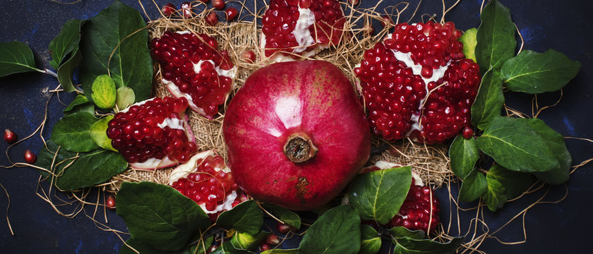 Red Pomegranate In The Starw, Rustic Style, Black Background, Top View