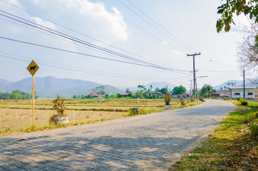 View of the village entrance in the countryside.