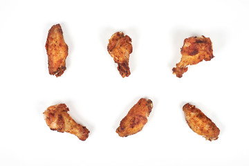 Fried chicken wings on white background