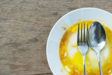 The dish is dirty by boiling eggs on the table background
