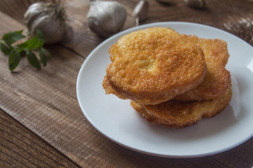 a delicious breakfast of toasted round hot toasts on a rural