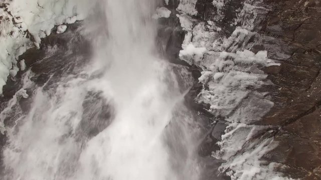 4k Aerial Snow Tennessee Waterfall Base 002 Tilt Up