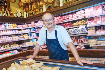 adult seller portrait in butcher store