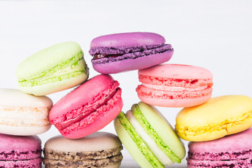 a set of colorful macaron cookies,on a gray background