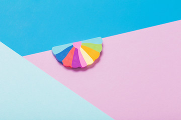colored paper background with an eraser