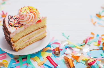 birthday cake and  decoration on white wooden background