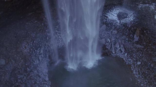 4k Aerial Snow Tennessee Waterfall Base to Crest 002 Boom Up