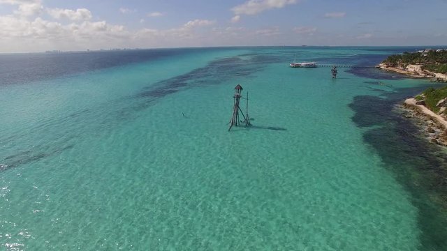 Aerial Mexico Crystal Clear Ocean Fly Over 010 pan right to island