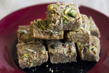 Mohanthal (sweetened gram flour fudges made with Ghee, and flavored with saffron and almonds) a Traditional Gujarati Sweet in Rajkot, Gujarat, India