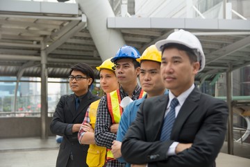 Businessmen standing in a row to present business success