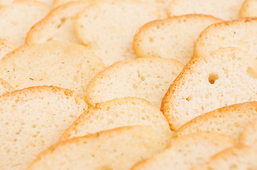 White toasts with ruddy crust closeup as background. Fast food backdrop.