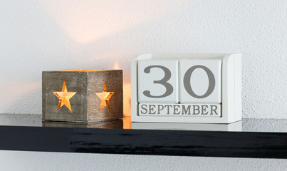 White block calendar present date 30 and month September