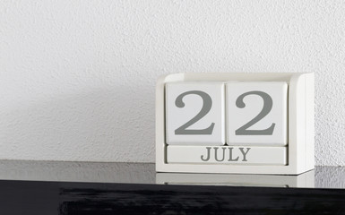 White block calendar present date 22 and month July