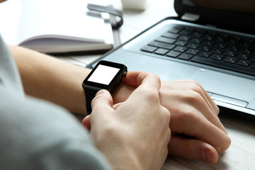 Smart clock on a guy's hand
