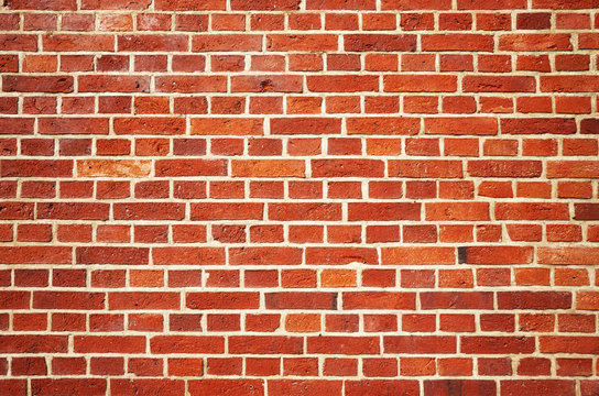 Old red brick wall background or wallpaper