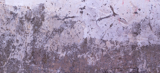 Old cracked rought gray and white plaster wall texture banner background
