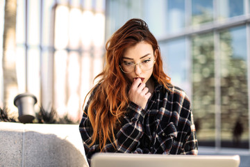 Pretty girl using a laptop