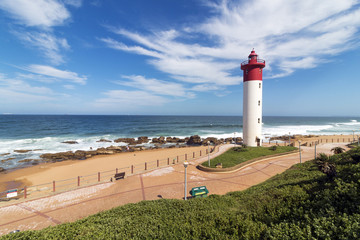  Lighthouse Against Blue Cloudy Coastal Seascape in South Africa