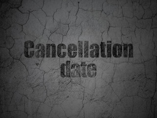 Law concept: Black Cancellation Date on grunge textured concrete wall background