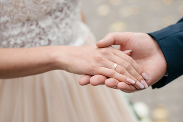 Hand in hand. Lovers walk in the fresh air.