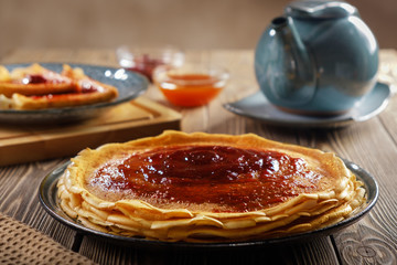 Pancakes with strawberry jam.