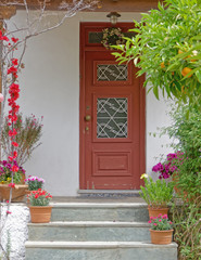 Athens Greece, vintage house entrance with flowers and plants