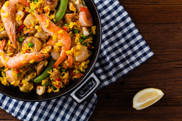 Traditional Spanish paella with seafood and chicken.