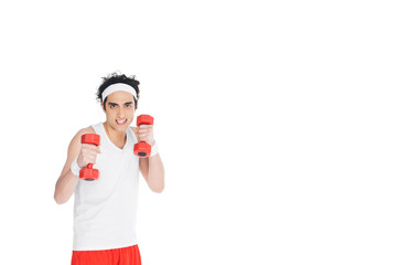 Young skinny man in sportswear holding dumbbels isolated on white