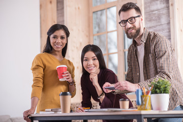 Great team. Pleasant positive nice people standing together and looking at you while working in team together