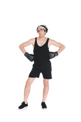 Young thin sportsman in boxing gloves isolated on white
