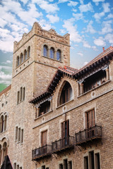 Fototapeta na wymiar Stone Tower in Old Barcelona Building