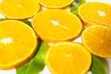 Slices of orange isolated on white background. top view;