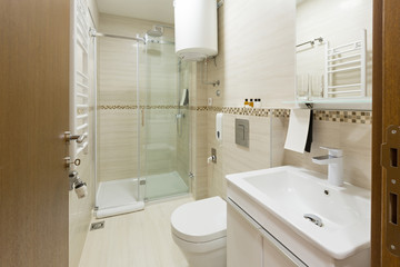 Interior of a hotel bathroom with shower cabin