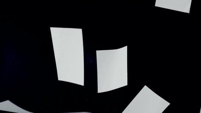 Blank paper sheets falling down