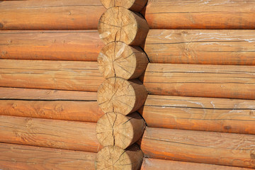 Brown wood log house texture as a surface background