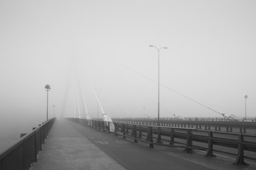 Bridge in the fog in Warsaw, Poland