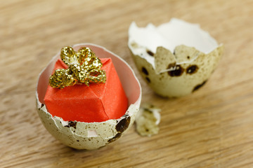 Gift box surprise concept, open egg shells symbol of born