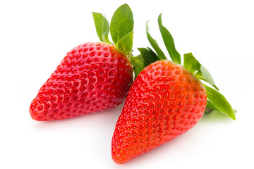 Fresh strawberries close up on white background.