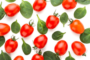 Spinach and tomato pattern background on white. Top view