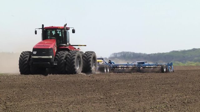 Modern tractor in the field